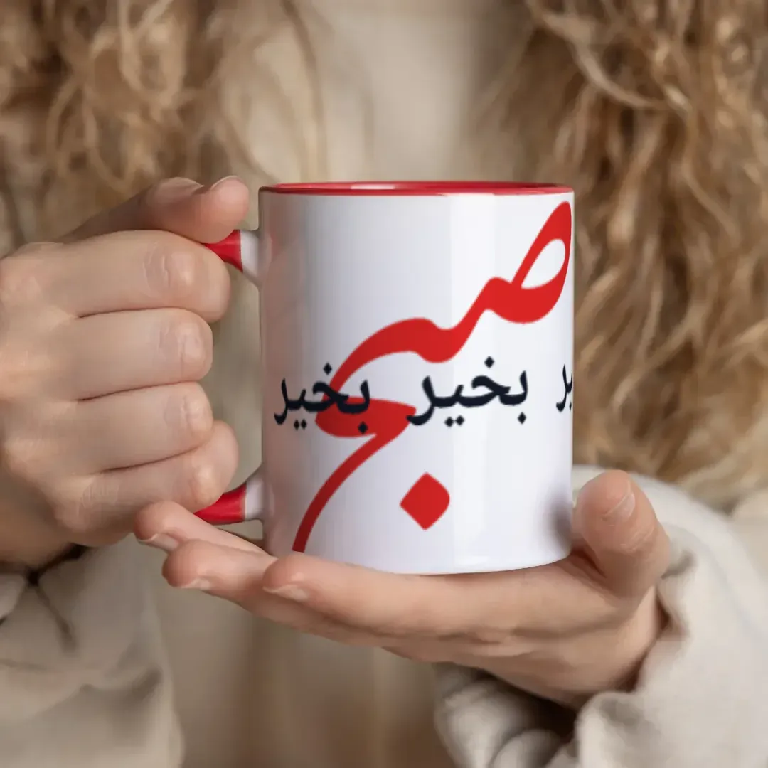 Subah Bakhair – Urdu Calligraphy ColorSplash Mug (Red), in hands view